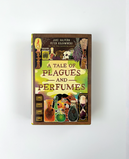 A girl looks through a shelf of bottles with different colors of potions.